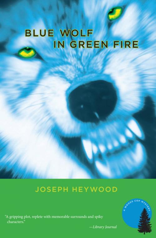 Cover of the book Blue Wolf In Green Fire by Joseph Heywood, Lyons Press