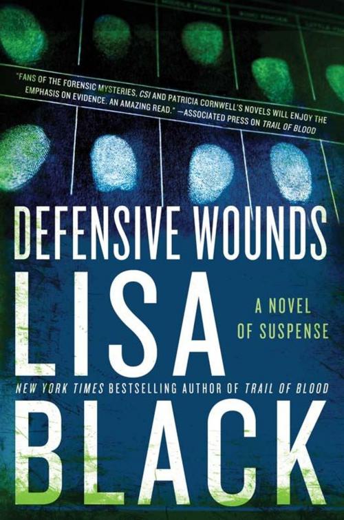 Cover of the book Defensive Wounds by Lisa Black, William Morrow