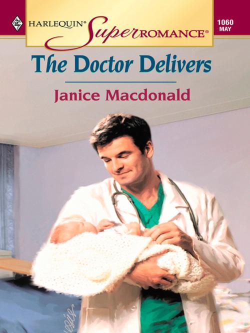 Cover of the book THE DOCTOR DELIVERS by Janice Macdonald, Harlequin