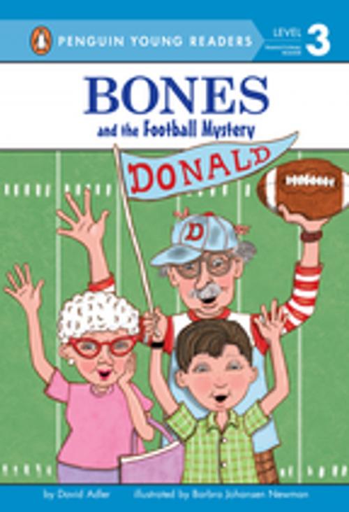 Cover of the book Bones and the Football Mystery by David A. Adler, Penguin Young Readers Group