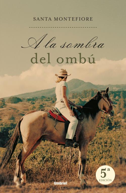 Cover of the book A la sombra del ombú by Santa Montefiore, Umbriel