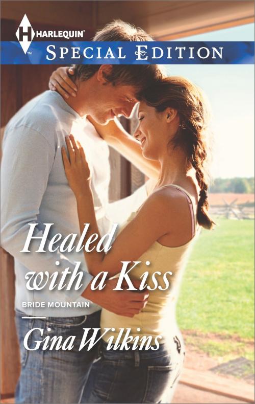 Cover of the book Healed with a Kiss by Gina Wilkins, Harlequin