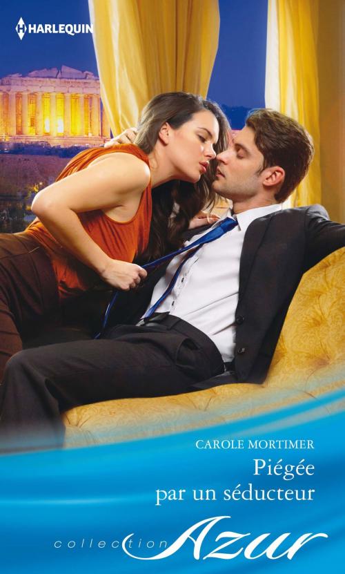 Cover of the book Piégée par un séducteur by Carole Mortimer, Harlequin