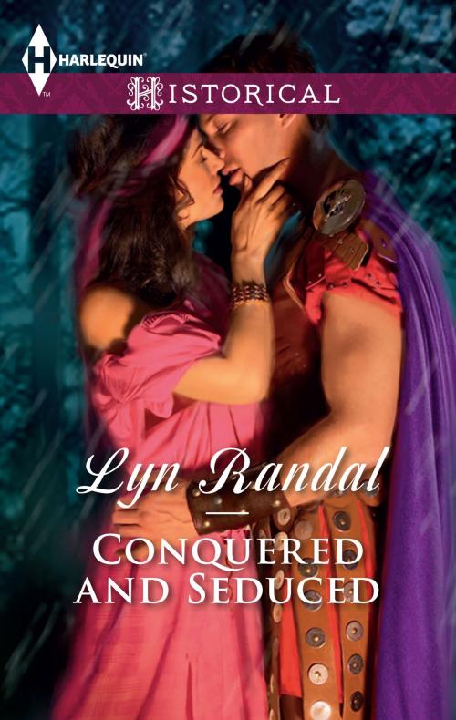 Cover of the book Conquered and Seduced by Lyn Randal, Harlequin