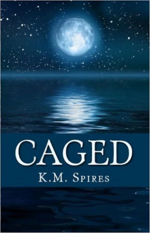 Cover of the book Caged by K.M. Spires, K.M. Spires