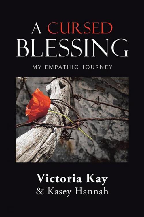 Cover of the book A Cursed Blessing by Kasey Hannah, Victoria Kay, Balboa Press