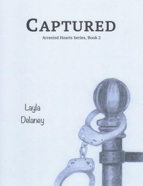 Cover of the book Captured - Arrested Hearts Series, Book 2 by Layla Delaney, Lulu.com