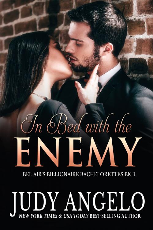 Cover of the book In Bed with the Enemy by Judy Angelo, Phoenix Publishing Limited