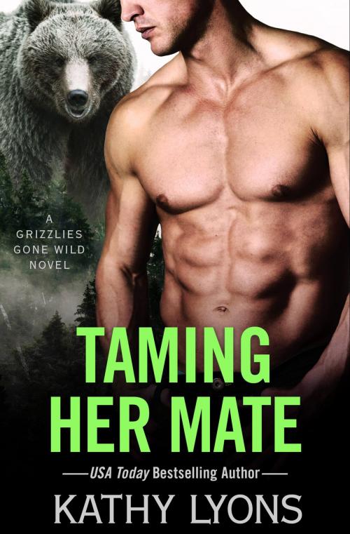 Cover of the book Taming Her Mate by Kathy Lyons, Grand Central Publishing