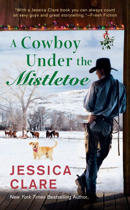 Cover of the book A Cowboy Under the Mistletoe by Jessica Clare, Penguin Publishing Group